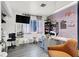 Office area with light purple walls, a nail station, a flatscreen tv, and windows at 3389 Commendation Dr, Las Vegas, NV 89117
