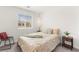 Cozy bedroom features a window with blinds and warm, inviting colors and textures at 3518 Herodain Ave, Las Vegas, NV 89106