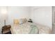 Bright bedroom featuring a comfortable bed and a sliding door closet for ample storage at 3518 Herodain Ave, Las Vegas, NV 89106