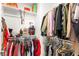 Walk-in closet providing ample storage with shelves and hanging rods for clothing and accessories at 3518 Herodain Ave, Las Vegas, NV 89106