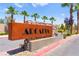 Stone and metal community sign with the name 'Arcadia' surrounded by palm trees at 3518 Herodain Ave, Las Vegas, NV 89106