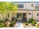 Charming townhome featuring a welcoming front porch and well-maintained landscaping at 3518 Herodain Ave, Las Vegas, NV 89106