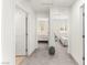 Hallway showcasing access to multiple bedrooms with consistent design elements and natural light at 3518 Herodain Ave, Las Vegas, NV 89106
