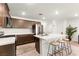 Well-equipped kitchen featuring an island with bar stool seating and stainless steel appliances at 3518 Herodain Ave, Las Vegas, NV 89106
