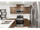 Bright kitchen with stainless steel appliances, and stone countertops at 3518 Herodain Ave, Las Vegas, NV 89106
