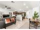 Open-concept living space featuring modern furnishings and stainless steel appliances at 3518 Herodain Ave, Las Vegas, NV 89106