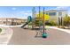 Community playground with a climbing structure, slide, and picnic shelter at 3518 Herodain Ave, Las Vegas, NV 89106
