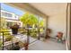 Relaxing front porch with potted plants and outdoor decor at 3518 Herodain Ave, Las Vegas, NV 89106