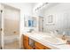 Bright bathroom with double vanity, white countertops, and tile flooring at 3786 Port Ritchey St, Las Vegas, NV 89147
