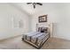 Bright bedroom featuring a queen-sized bed and a window with natural light at 3786 Port Ritchey St, Las Vegas, NV 89147