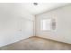 Neutral bedroom with carpet flooring, closet, and bright window at 3786 Port Ritchey St, Las Vegas, NV 89147