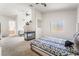Spacious bedroom with a fireplace and view of the neighborhood at 3786 Port Ritchey St, Las Vegas, NV 89147
