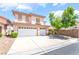 Charming two-story home with a three-car garage and desert landscaping at 3786 Port Ritchey St, Las Vegas, NV 89147