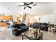 Open-concept living room featuring a seamless transition into the kitchen and offering ample space for relaxation and entertaining at 3786 Port Ritchey St, Las Vegas, NV 89147