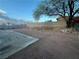 Spacious backyard offers ample space for outdoor activities and future landscaping at 407 Tiger Lily Way, Henderson, NV 89015