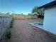 Large backyard space with rock cover offers potential for landscaping at 407 Tiger Lily Way, Henderson, NV 89015