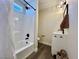 Updated bathroom featuring a tub and shower combination, modern vanity, and stylish fixtures at 407 Tiger Lily Way, Henderson, NV 89015