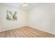 Bright bedroom with hardwood floors, a ceiling fan and a window offering ample natural light at 429 Scenic Dr, Henderson, NV 89002