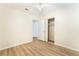 Well-lit bedroom featuring hardwood floors, a ceiling fan, and closet providing ample storage space at 429 Scenic Dr, Henderson, NV 89002
