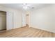 Comfortable bedroom featuring hardwood floors, a closet, and a ceiling fan for added comfort at 429 Scenic Dr, Henderson, NV 89002