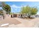 Charming single-story home with a well-maintained front yard and driveway at 429 Scenic Dr, Henderson, NV 89002