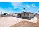 Expansive backyard with a large patio area and ample space for outdoor activities at 4442 Bennett Dr, Las Vegas, NV 89121