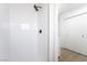 Tiled walk-in shower with sleek, black fixtures and a bright, modern design at 4442 Bennett Dr, Las Vegas, NV 89121