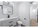 Bathroom featuring a modern vanity with a white countertop and sleek, black hardware at 4442 Bennett Dr, Las Vegas, NV 89121