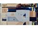 Aerial view of a home with a gray shingle roof, modern AC unit, and enclosed backyard at 4681 Via San Rafael, Las Vegas, NV 89103