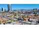 An aerial view of a neighborhood showcasing a single-story home near the city at 4681 Via San Rafael, Las Vegas, NV 89103