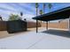 Spacious backyard with a covered patio, storage shed, and low-maintenance landscaping at 4681 Via San Rafael, Las Vegas, NV 89103