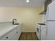 Bright kitchen features stainless steel appliances, white cabinets, and plenty of counter space at 4681 Via San Rafael, Las Vegas, NV 89103