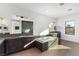 Modern bathroom with a soaking tub, dual vanities, and a large window at 5725 El Royale Ct, Las Vegas, NV 89149