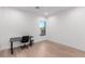 Bright room featuring a desk, chair, and window at 5725 El Royale Ct, Las Vegas, NV 89149