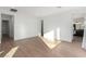 Minimalist bedroom featuring an attached bathroom and ample natural light for a bright feel at 5725 El Royale Ct, Las Vegas, NV 89149