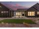 Contemporary home exterior with a manicured lawn, desert landscaping and modern design at 5725 El Royale Ct, Las Vegas, NV 89149