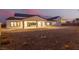 Long view of home's backyard featuring a covered patio at 5725 El Royale Ct, Las Vegas, NV 89149