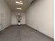 Spacious garage with neutral walls, cement floors, and good lighting at 5725 El Royale Ct, Las Vegas, NV 89149