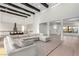 Spacious living room featuring an open floor plan, high ceilings, and white color palette at 5725 El Royale Ct, Las Vegas, NV 89149