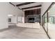 A spacious living room with wood accents and a modern fireplace at 5725 El Royale Ct, Las Vegas, NV 89149