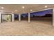 Covered patio with stone flooring and lots of room for entertaining at 5725 El Royale Ct, Las Vegas, NV 89149