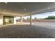 Spacious covered patio with stone flooring perfect for entertaining at 5725 El Royale Ct, Las Vegas, NV 89149