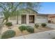 Charming single-story home with desert landscaping in the front yard at 5833 Craigmore Ln, North Las Vegas, NV 89031
