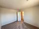 Neutral carpeted bedroom with closet doors at 7748 Catalina Harbor St, Las Vegas, NV 89131