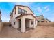 Exterior showcasing a covered patio and spacious backyard at 785 Black Palace St, Henderson, NV 89011