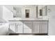 Bright bathroom featuring dual sinks, soaking tub, and plenty of storage at 785 Black Palace St, Henderson, NV 89011