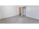 Bedroom featuring a carpeted floor with closet and door to another room at 785 Black Palace St, Henderson, NV 89011