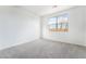 Bedroom showcasing a carpeted floor and a window with a view at 785 Black Palace St, Henderson, NV 89011