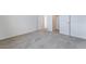 Bedroom featuring a carpeted floor with a door to another room and closet at 785 Black Palace St, Henderson, NV 89011