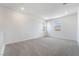 Spacious loft area with neutral carpet and natural light from windows at 785 Black Palace St, Henderson, NV 89011